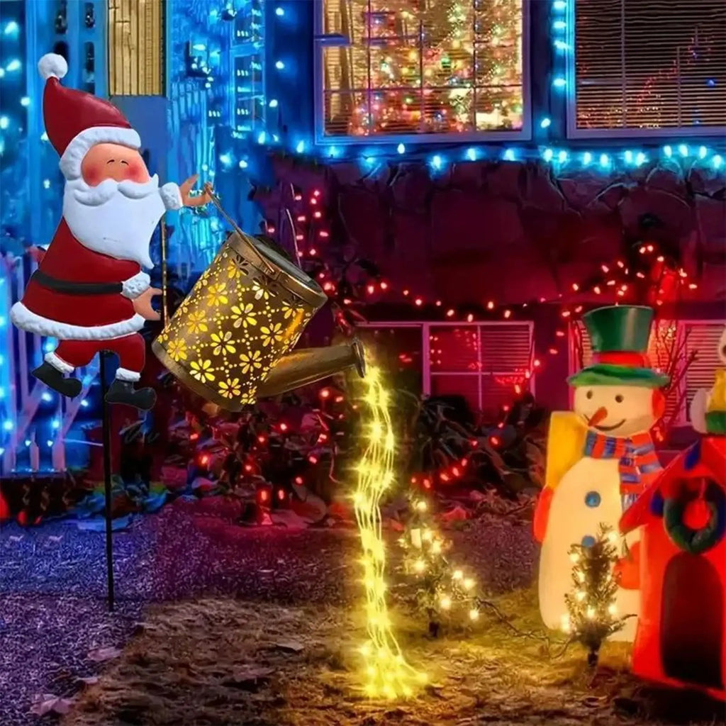 Lanterna de jardim solar com motivos natalinos, em forma de regador, com luzes LED, para uso exterior, à prova de água, em metal, para decoração de jardins e pátios.