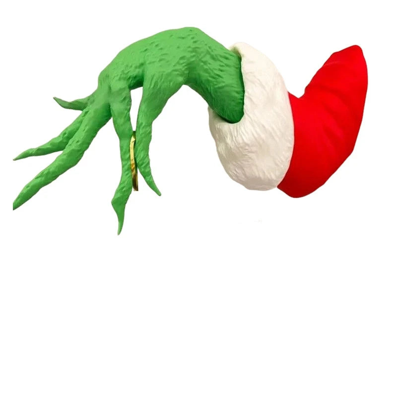 A árvore de Natal de fada é decorada com brinquedos de pelúcia verdes, marionetes de armas de monstro e árvores de Natal de fadas para decorar a festa
