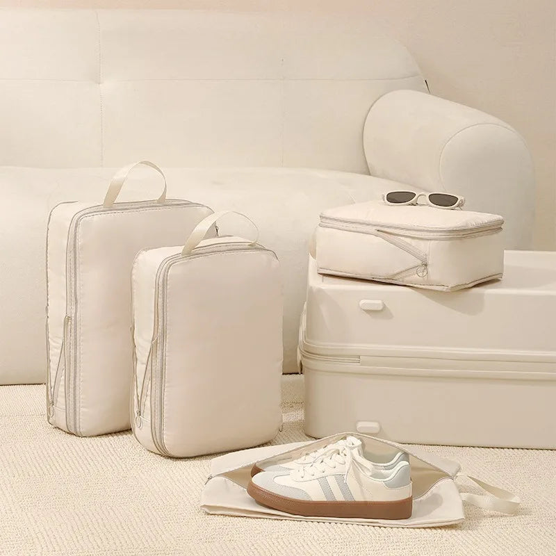 Conjunto de cubos de embalagem de viagem de 4 unidades – Organizadores de roupas de compressão para mala, sacos de armazenamento de bagagem à prova d'água e organizadores de gaveta