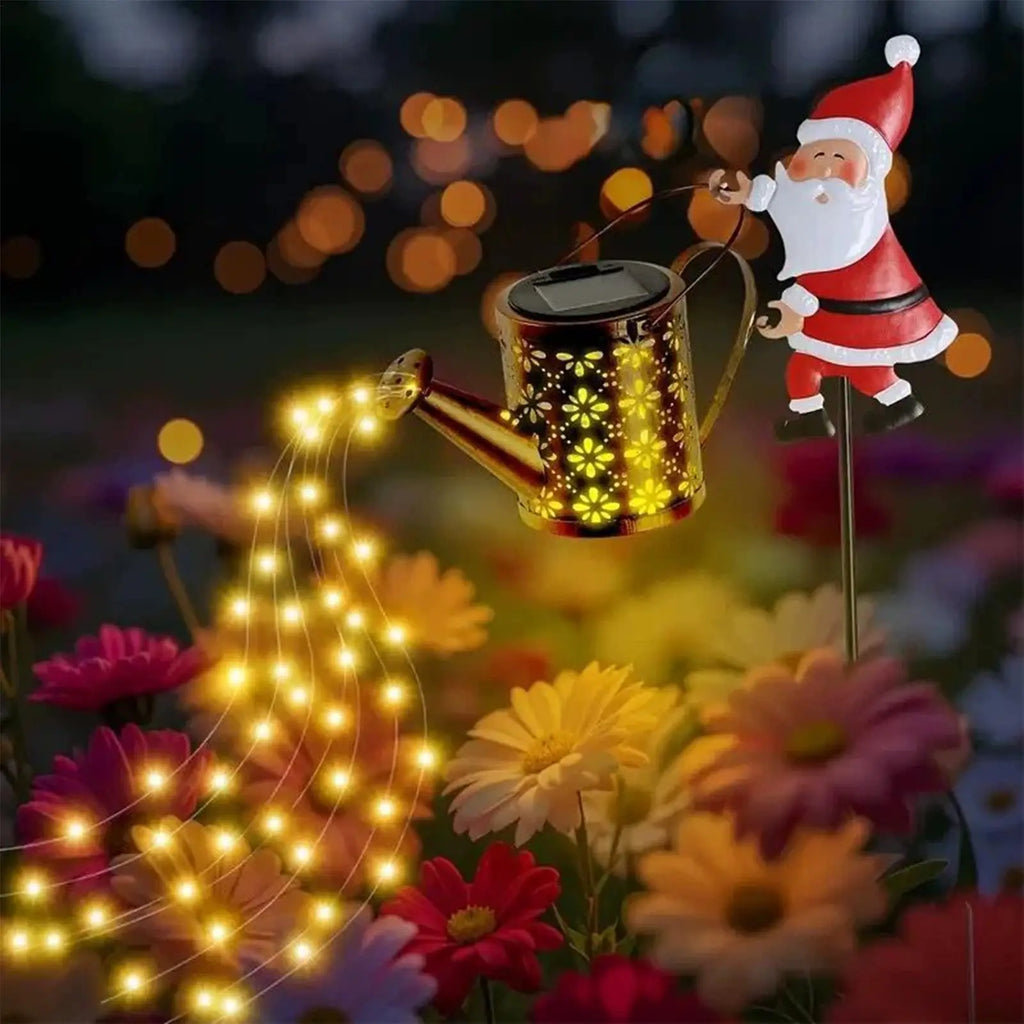 Lanterna de jardim solar com motivos natalinos, em forma de regador, com luzes LED, para uso exterior, à prova de água, em metal, para decoração de jardins e pátios.